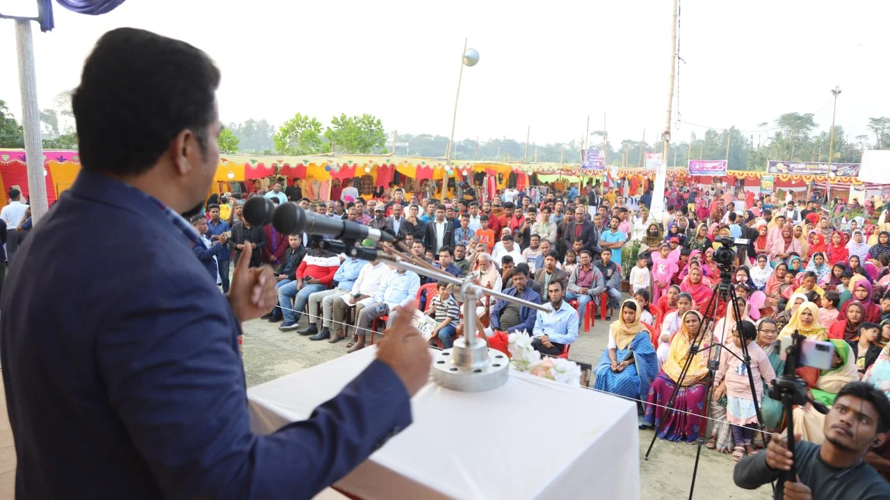 Imam speaking at fair