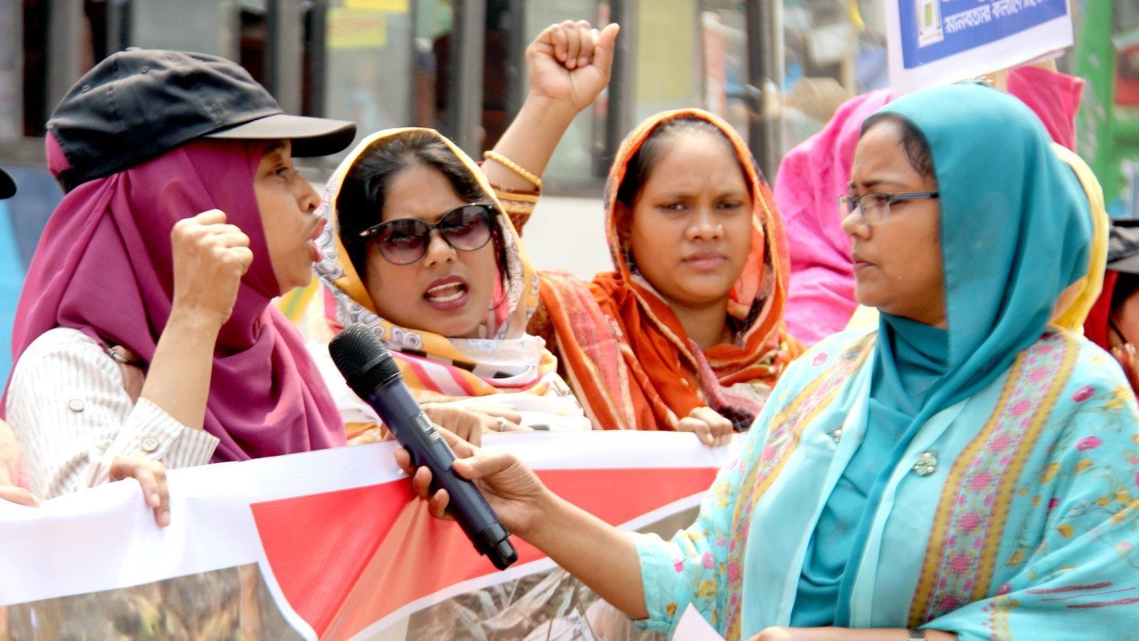 Journalist interviewing protester